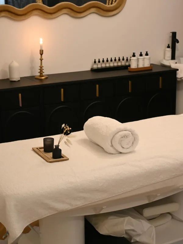 couples sanctuary room with candle and treatment table